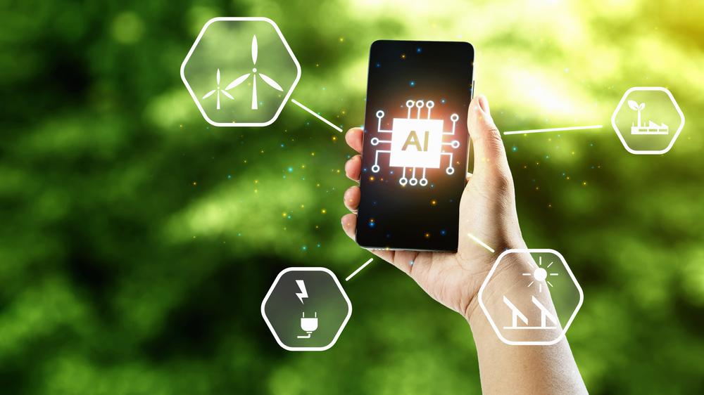 Hand holding a smartphone with an AI chip icon linked to energy and infrastructure symbols